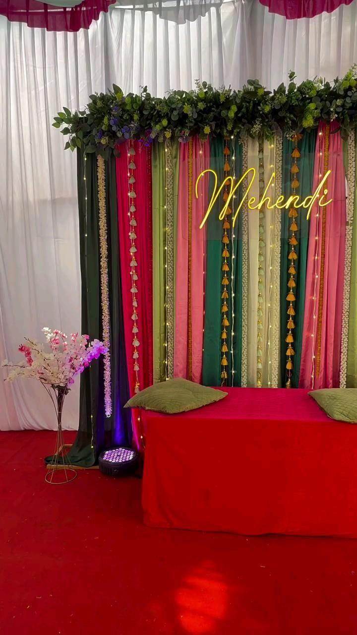 Neon Mehendi artist backdrop